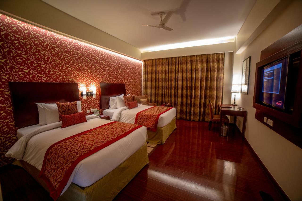 Hotel Ramada By Wyndham Jaipur Jaisinghpura Exterior foto